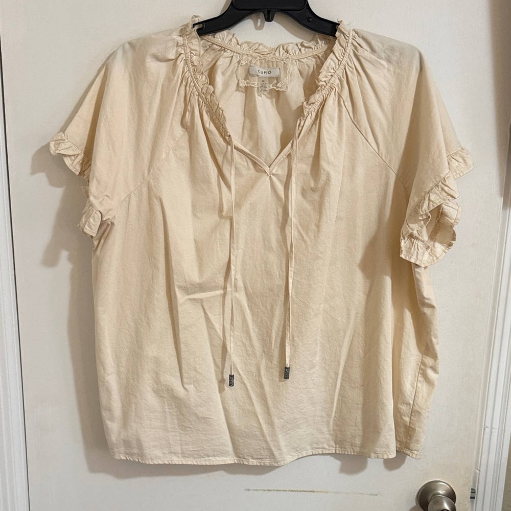 Cupio Cream Ruffle Sleeve Blouse